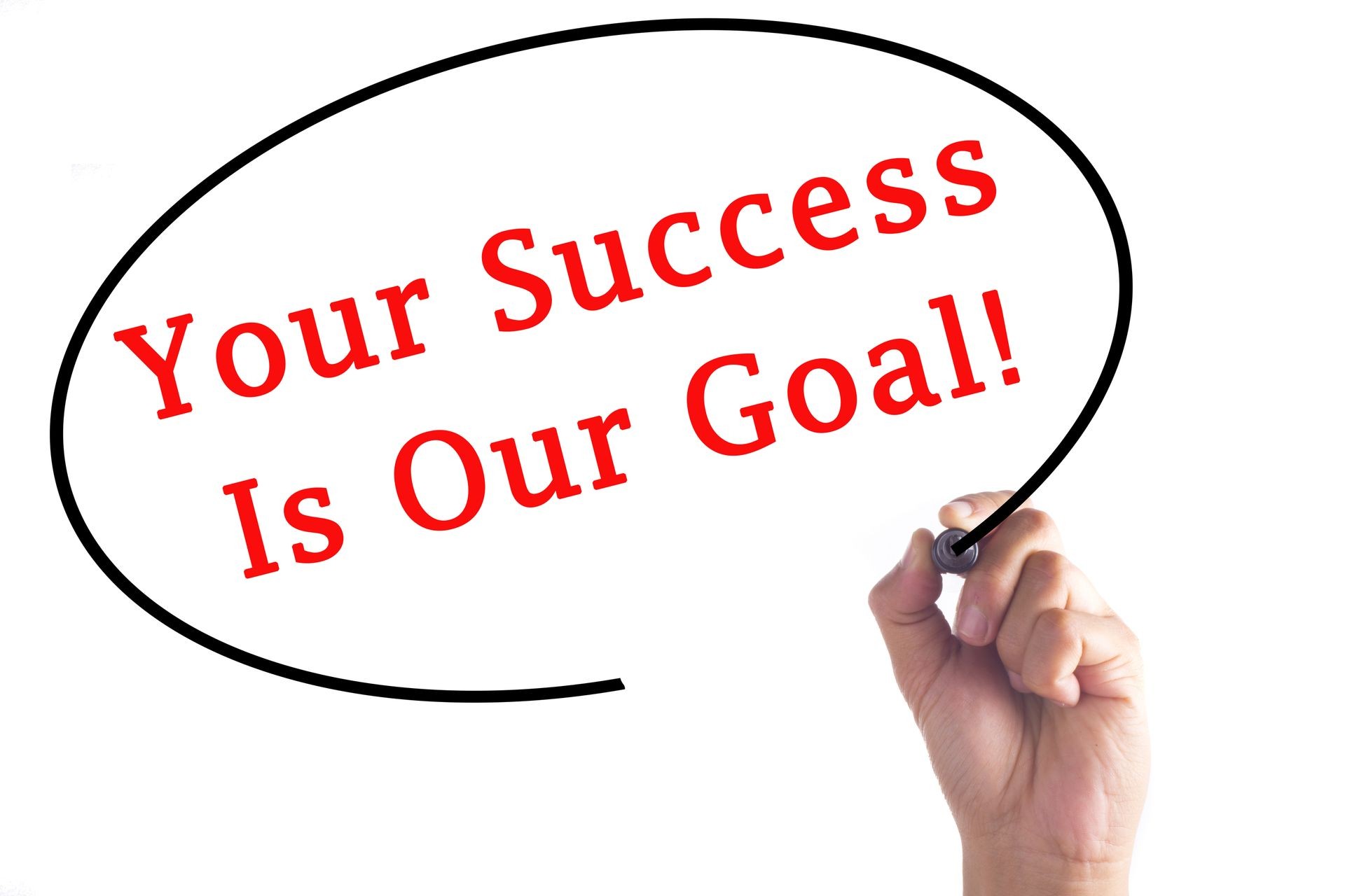 Hand writing Your Success Is Our Goal on transparent board